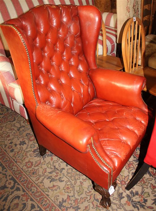 Red leather wing arm chair